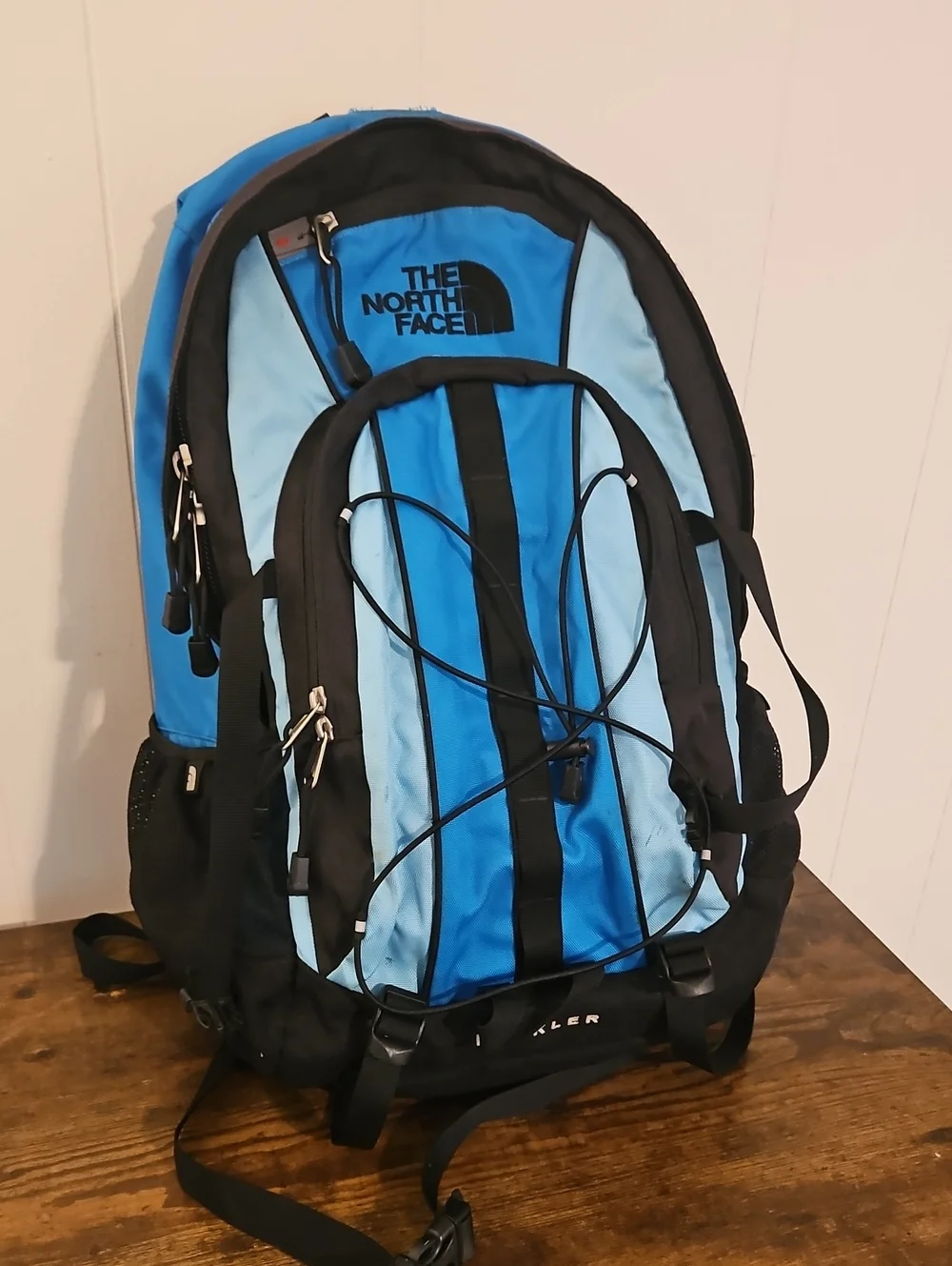 The North Face Blue and Light Blue Men's Backpack with Bungee Gear Cord